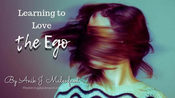 Learning to love the ego - title text and credit to Anik J. Malenfant on an image of a woman swishing her brunette hair across her face