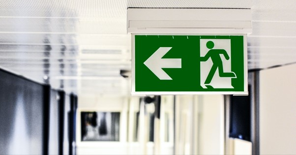 Soul vs ego - exit sign pointing to the left